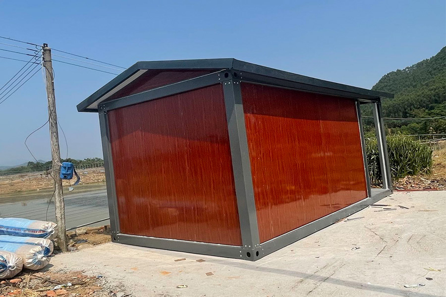 Wood color prefab container with double pitch roof